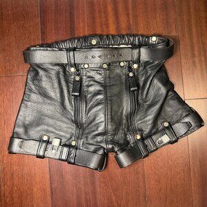 Vintage leather kink shorts crafted from thick black leather